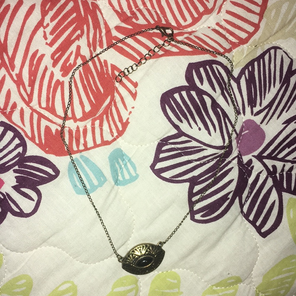 Black and gold pendant necklace